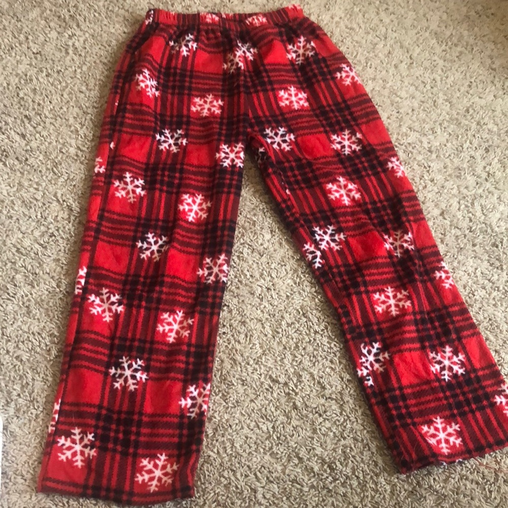 These are cute plaid pajama pants with cute snow flakes on them!